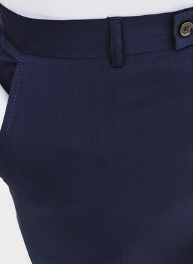 Tamsiai mėlynos spalvos vilnonės kostiuminės kelnės