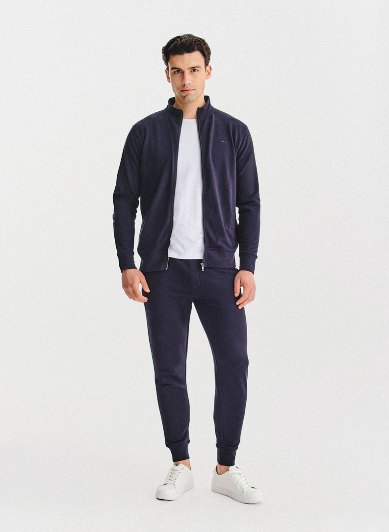 Tamsiai mėlynos treninginės kelnės