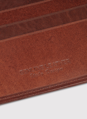 Spūsčiuku segama ruda odinė piniginė