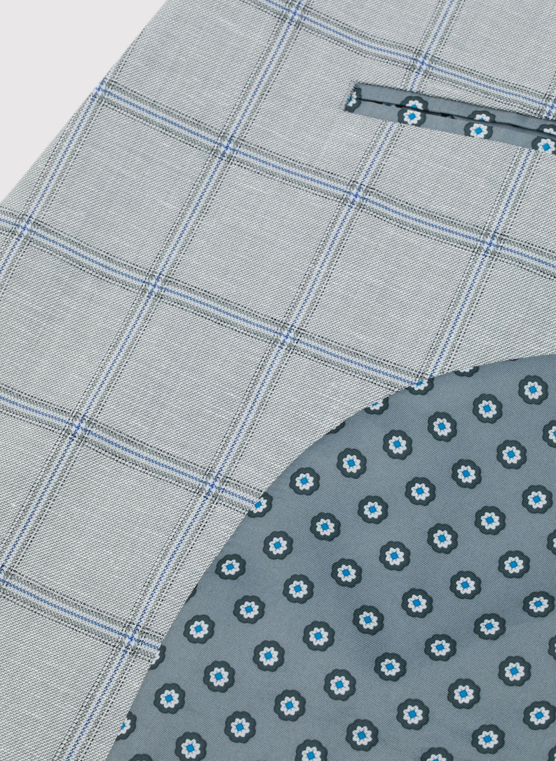 Pilkas vyriškas švarkas dideliais kvadratais