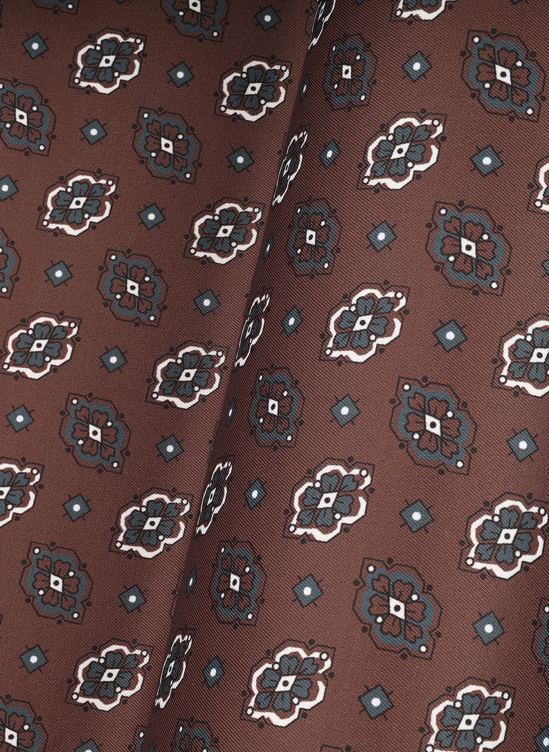 Ruda raštuota vyriška kišeninė nosinaitė