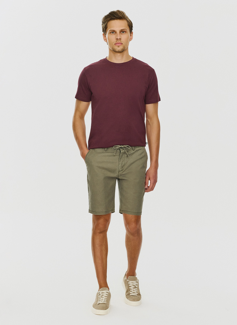 Žali vyriški šortai be raštų