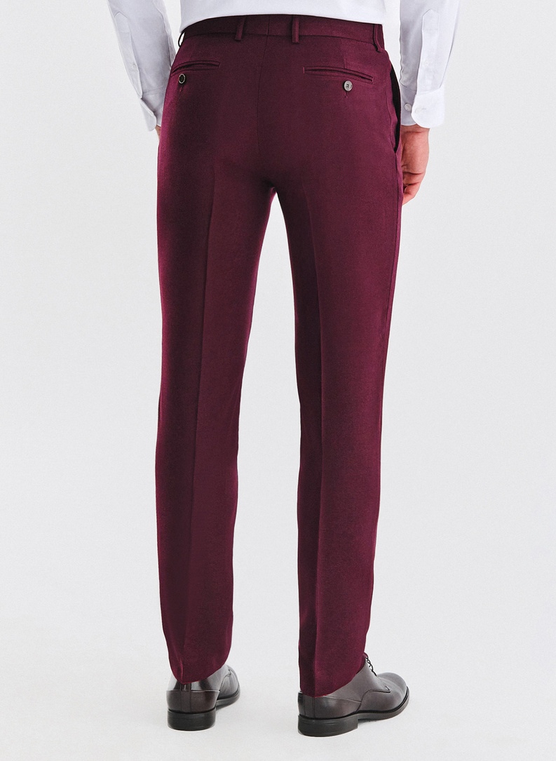 Tamsiai raudonos kostiuminės kelnės