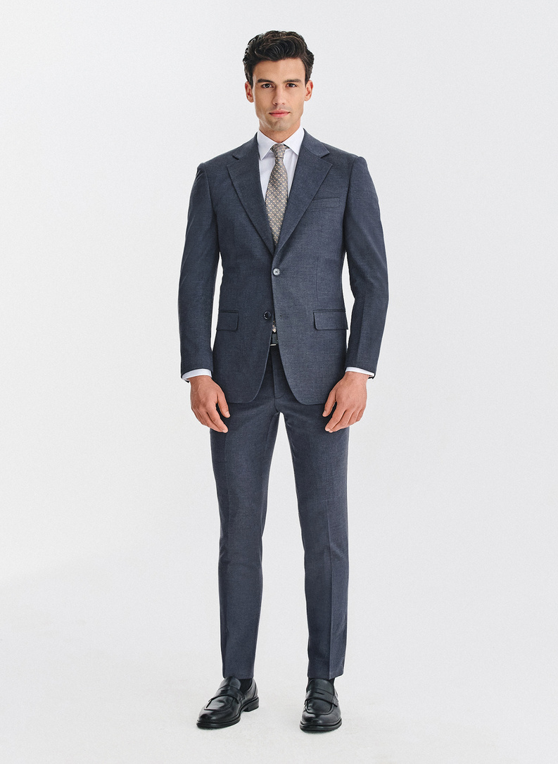 Tamsiai mėlynos kostiuminės kelnės