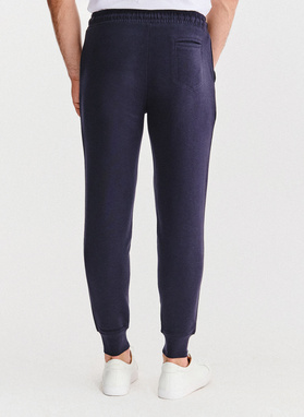 Tamsiai mėlynos treninginės kelnės