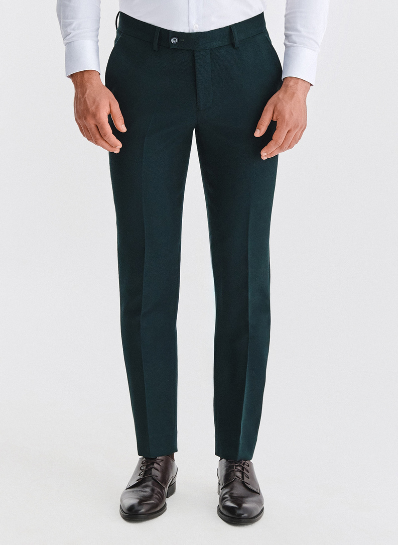 Žalios kostiuminės kelnės