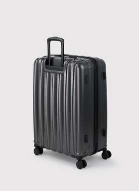 Didelis tamsiai pilkas lagaminas su grioveliais