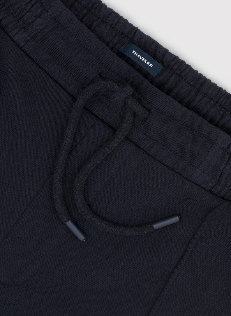 Tamsiai mėlynos spalvos treninginės kelnės