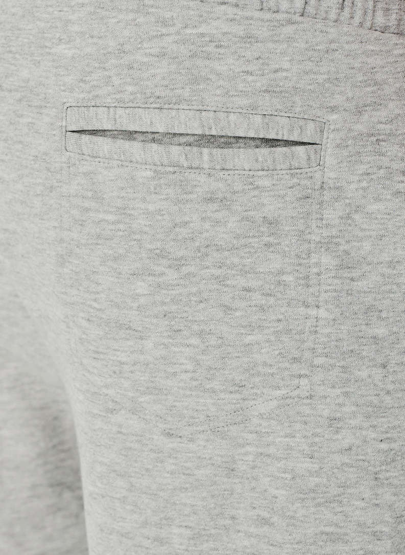 Pilkos spalvos trikotažinės treninginės kelnės