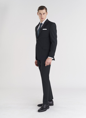 Vilnonės žalios kostiuminės kelnės